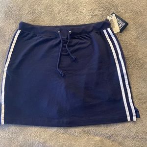 Navy athletic skirt with shorts, size Large, new with tags!